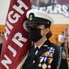  NJROTC member holding flag